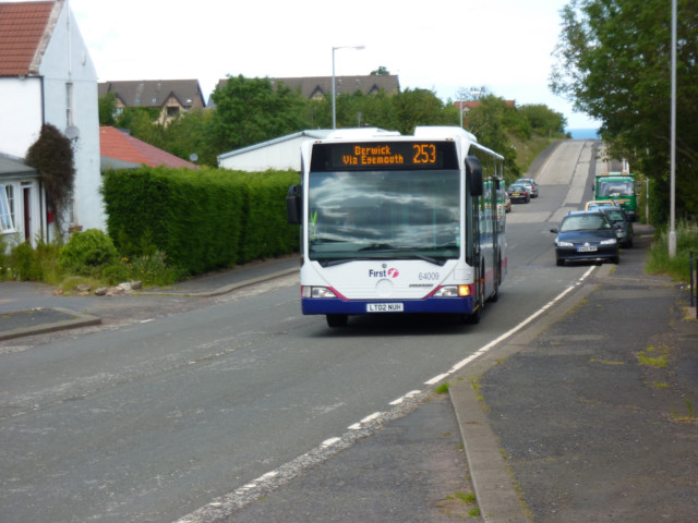 A bus to Berwick-upon-Tweed arrives at a bus stop in Cockburnspath